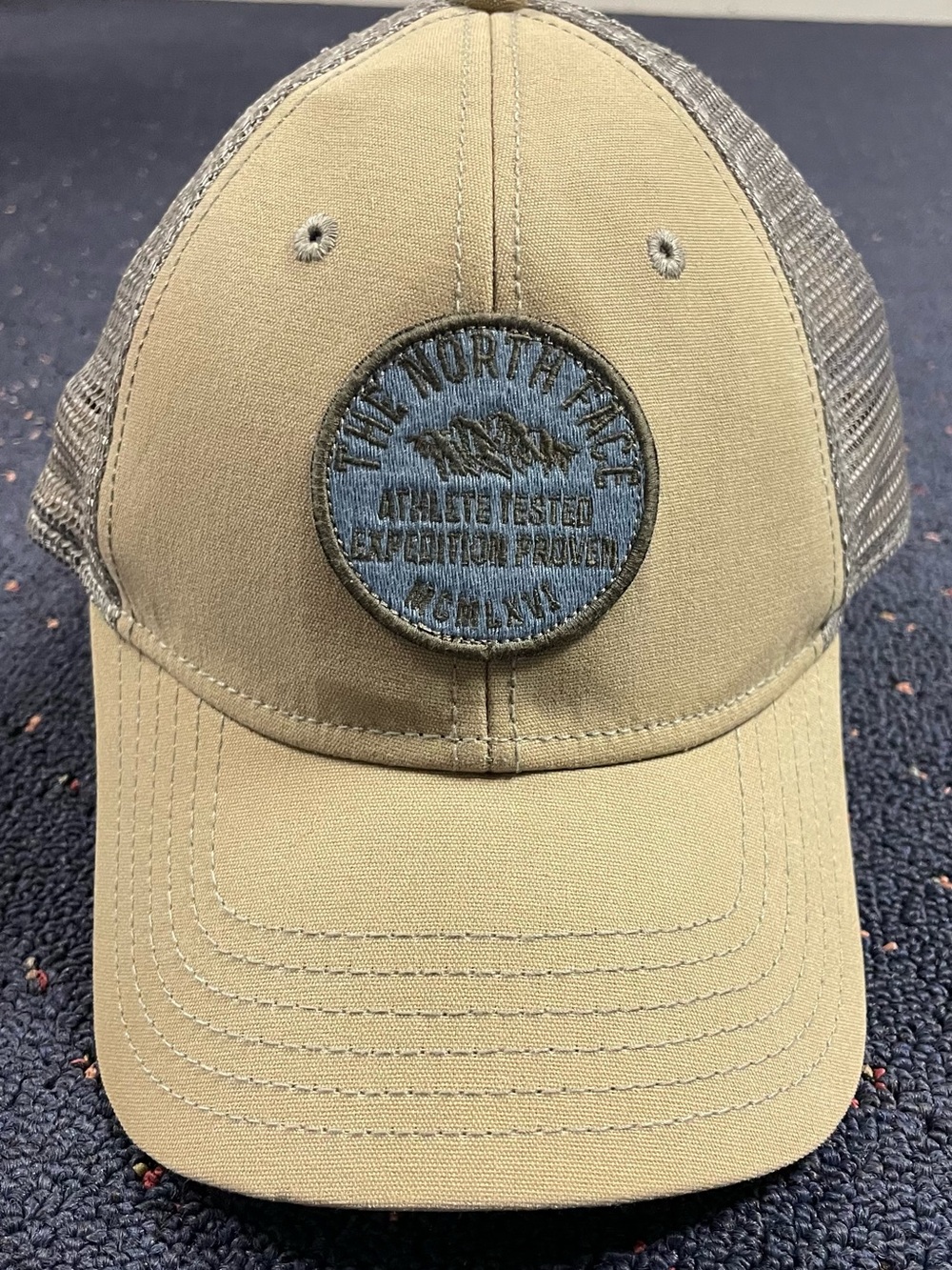 The North Face Tan Mesh-Back Trucker Hat with Blue/Grey Patch